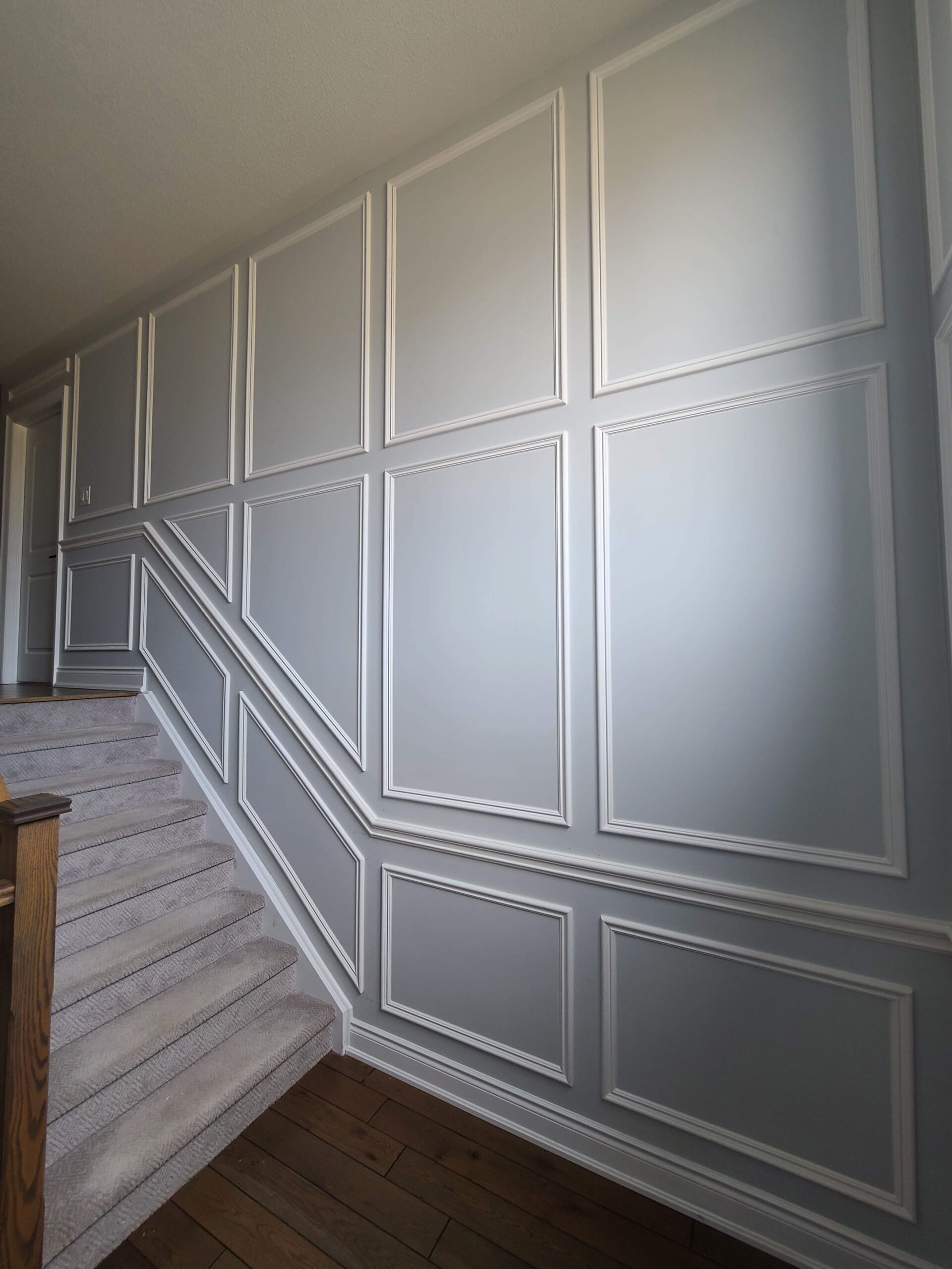 Full wall wainscoting, double level with chair rail on a staircase staircase, Oakville, ON