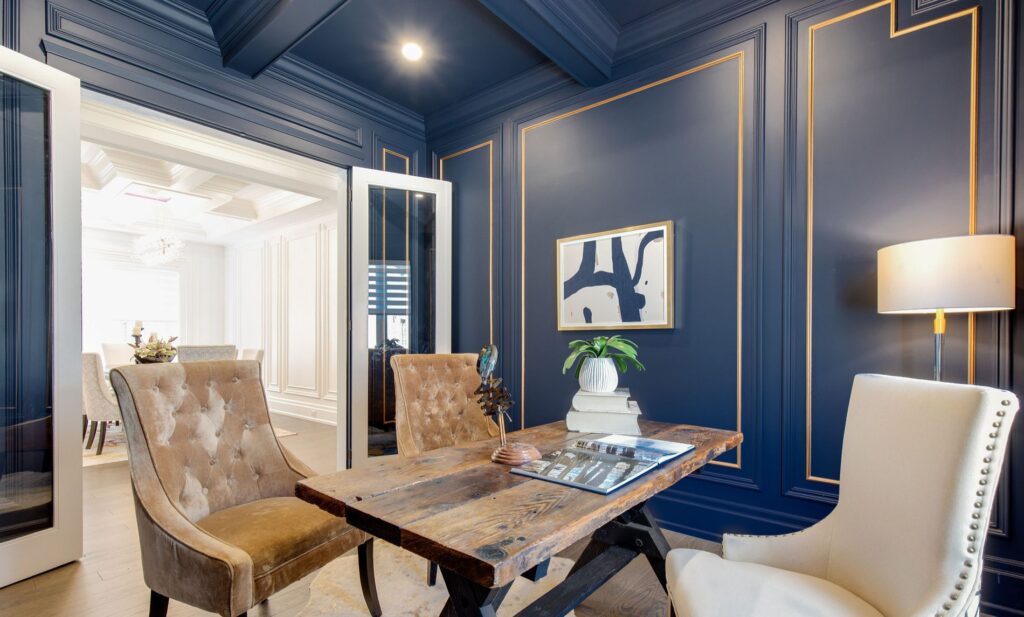 Full wall wainscoting and waffle ceiling in the office room in Oakville
