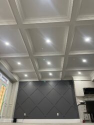 Waffle ceiling and accent wall in family room in house in Mississauga