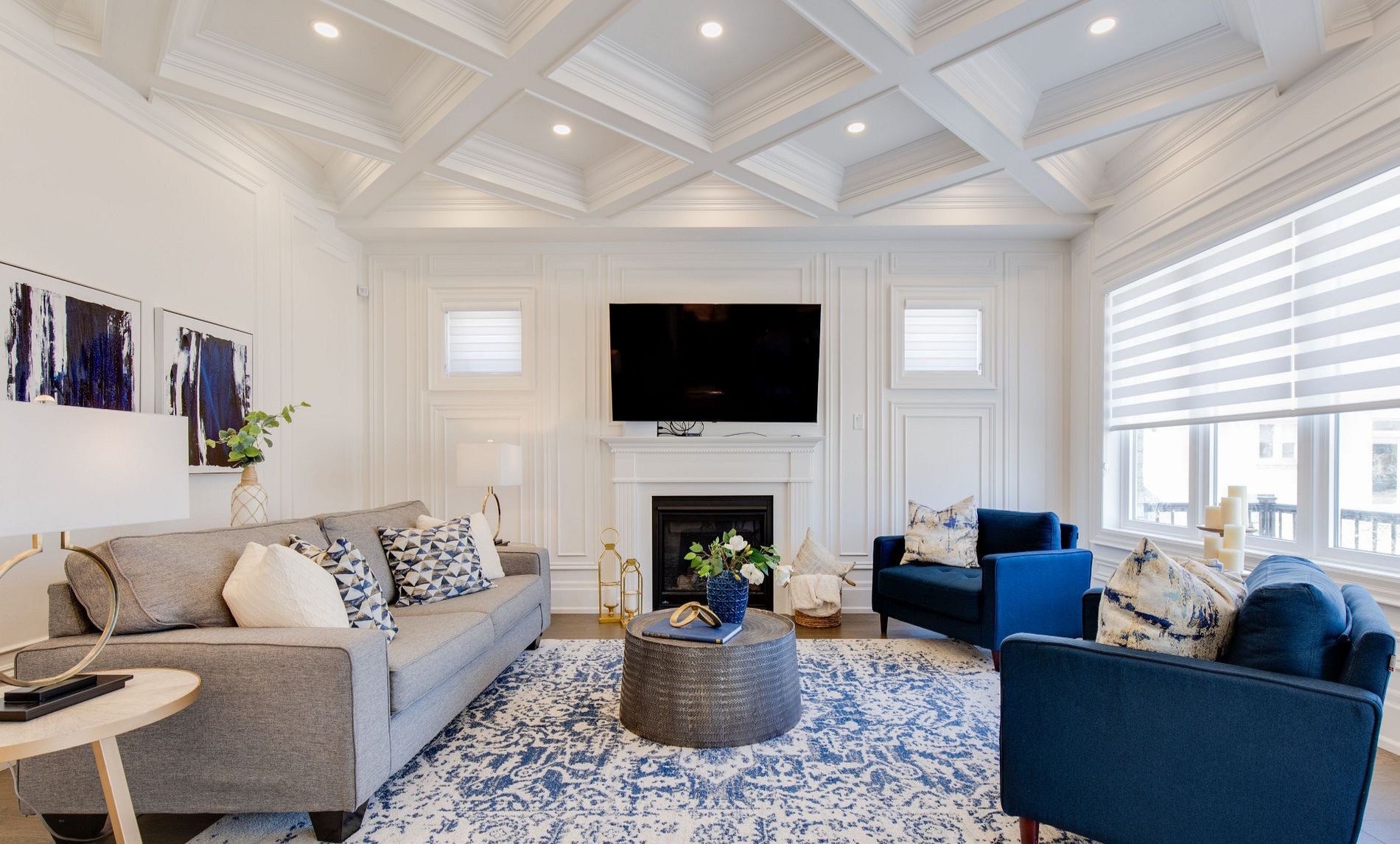 Luxurious waffle ceiling and wainscoting in the family room at the house in Mississauga