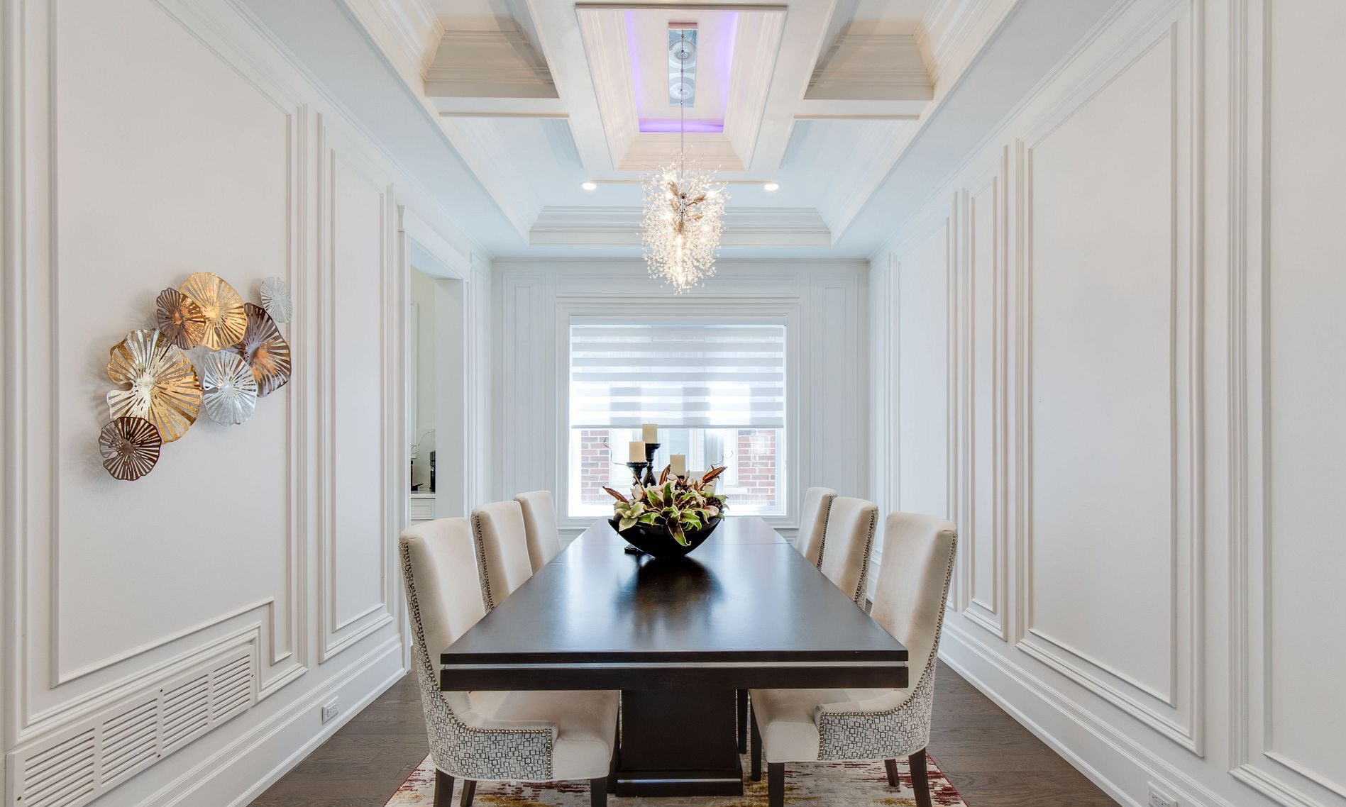 Full wall wainscoting, double box and waffle ceiling, baseboard at the dining room in Toronto, ON